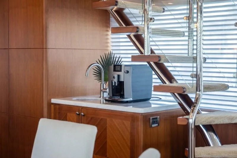 Chindon Yacht Photos Pics Luxurious 2017 Ocean Alexander motor yacht interior with modern coffee machine and elegant staircase.