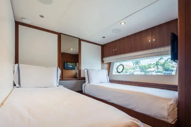 Chindon Yacht Photos Pics Luxurious 2017 Ocean Alexander motor yacht cabin with twin beds and scenic window view.