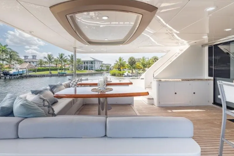 Chindon Yacht Photos Pics Luxurious 2017 Ocean Alexander motor yacht deck with elegant seating and waterfront view.