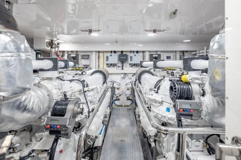 Chindon Yacht Photos Pics Engine room of a 2017 Ocean Alexander Motor Yacht, showcasing advanced machinery and equipment.