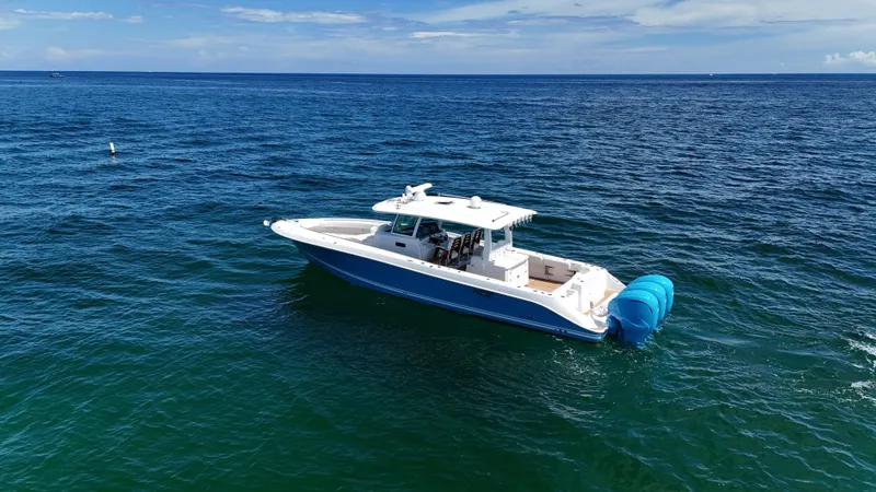  Yacht Photos Pics 2022 HCB Lujo boat cruising on open blue ocean waters.