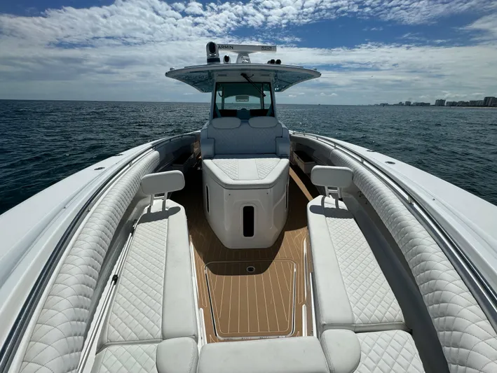  Yacht Photos Pics Luxurious 2022 HCB Lujo boat interior with white seating, open sea view.