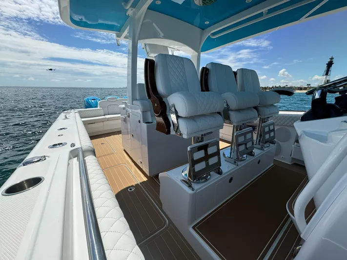  Yacht Photos Pics Luxury 2022 HCB Lujo boat interior with plush seating and ocean view.