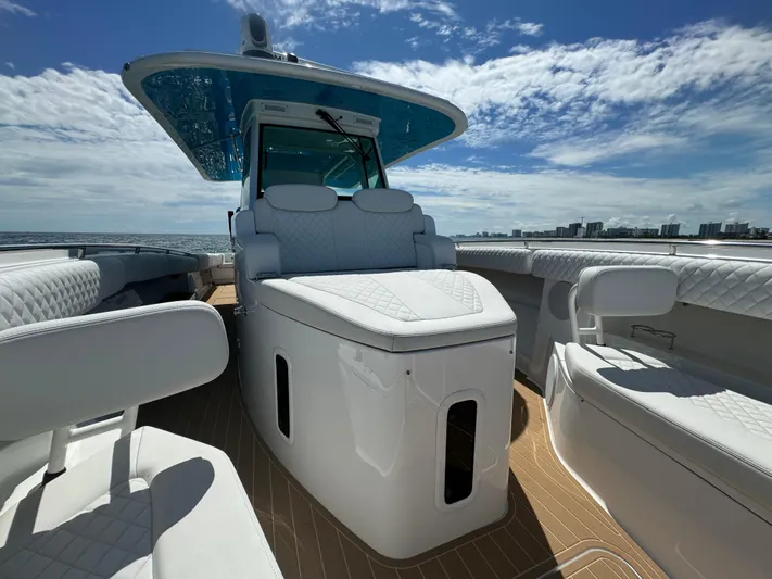  Yacht Photos Pics Luxurious 2022 HCB Lujo boat interior with white seating and ocean view.