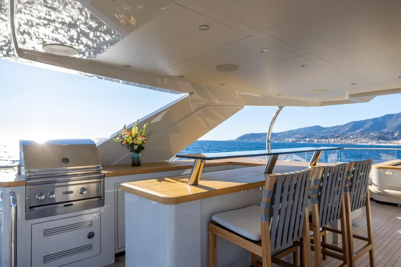 Stellamar Yacht Photos Pics Luxury yacht RJ 115 by Cantiere Delle Marche, 2023, featuring an elegant outdoor bar and grill.