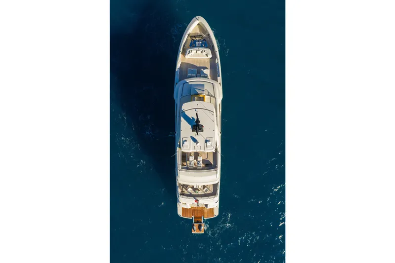 Stellamar Yacht Photos Pics Aerial view of 2023 Cantiere Delle Marche RJ 115 yacht on blue ocean water.