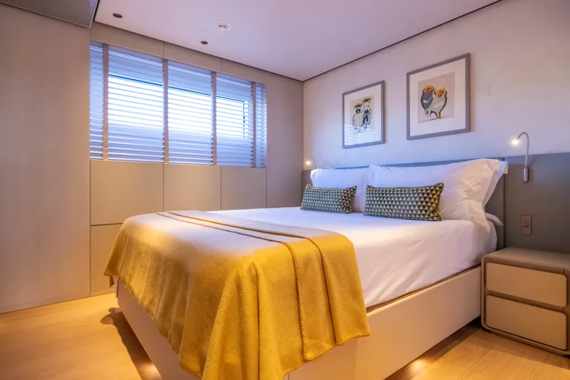 Stellamar Yacht Photos Pics Luxurious bedroom interior on 2023 Cantiere Delle Marche RJ 115 yacht, featuring modern decor.