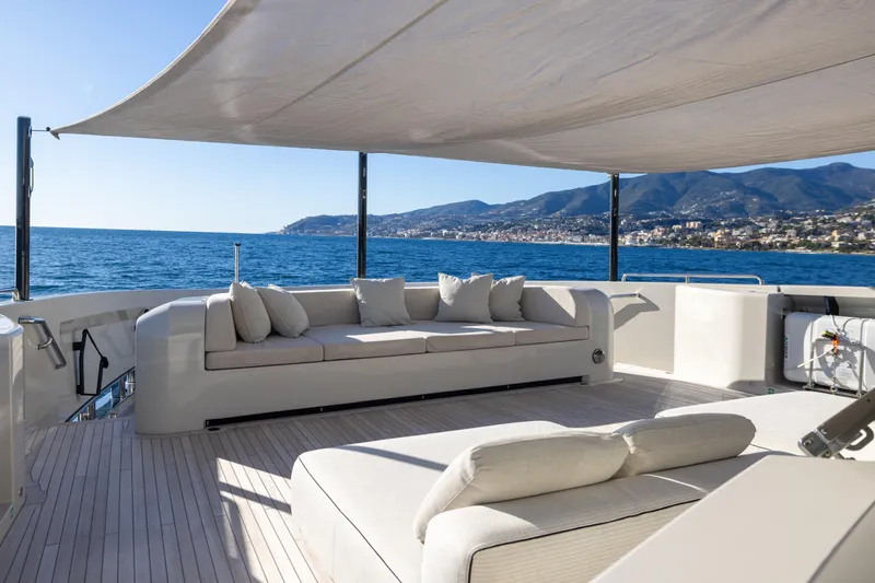 Stellamar Yacht Photos Pics Luxurious 2023 Cantiere Delle Marche RJ 115 yacht deck with ocean view and comfortable seating.