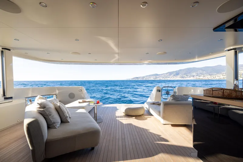Stellamar Yacht Photos Pics Luxurious 2023 Cantiere Delle Marche RJ 115 yacht deck with ocean view and elegant seating.