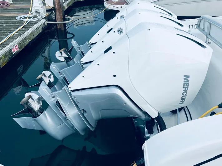 Donnalee2 Yacht Photos Pics 2004 Fountain 38 LX boat with Mercury outboard engines at dock.