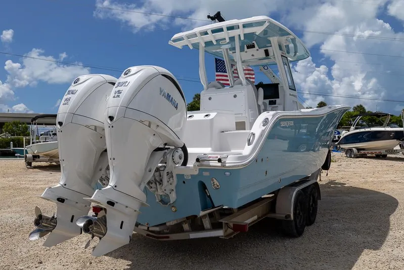  Yacht Photos Pics 2026 Sea Fox 288 Commander boat with twin Yamaha engines on a trailer.
