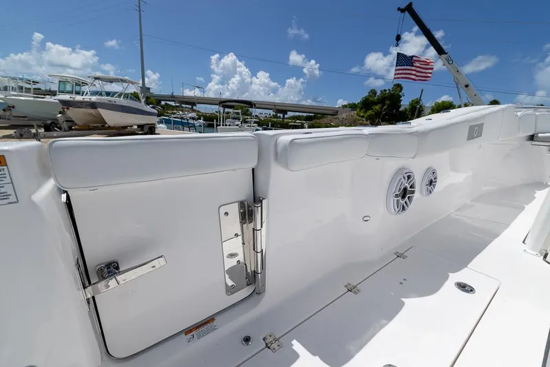  Yacht Photos Pics 2026 Sea Fox 288 Commander boat interior with speakers and American flag in background.