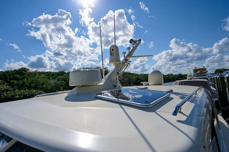 Pb45 2017 Yacht Photos Pics 2017 Palm Beach Motor Yachts PB45 under a bright blue sky with clouds.