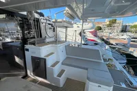 Modern Leopard 42 yacht interior, featuring sleek seating and marina view, 2022 model.
