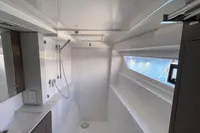 Modern bathroom interior on a 2022 Leopard 42 yacht, featuring sleek design and ocean view.