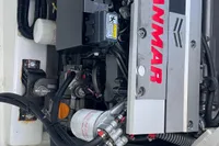 Yanmar engine in a 2022 Leopard 42 boat, showcasing mechanical components and branding.
