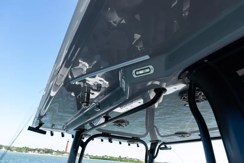  Yacht Photos Pics 2024 Freeman 47 boat canopy with sleek design and integrated lighting, ocean view.