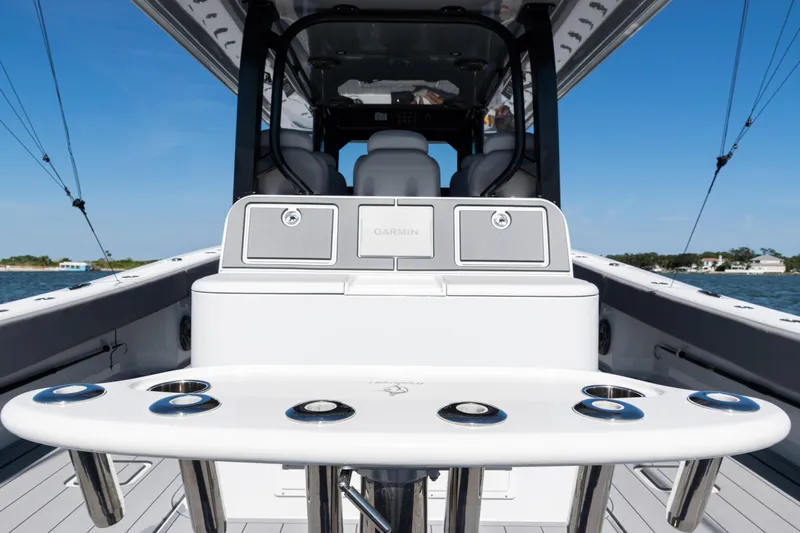  Yacht Photos Pics 2024 Freeman 47 boat interior with fishing rod holders and Garmin equipment.