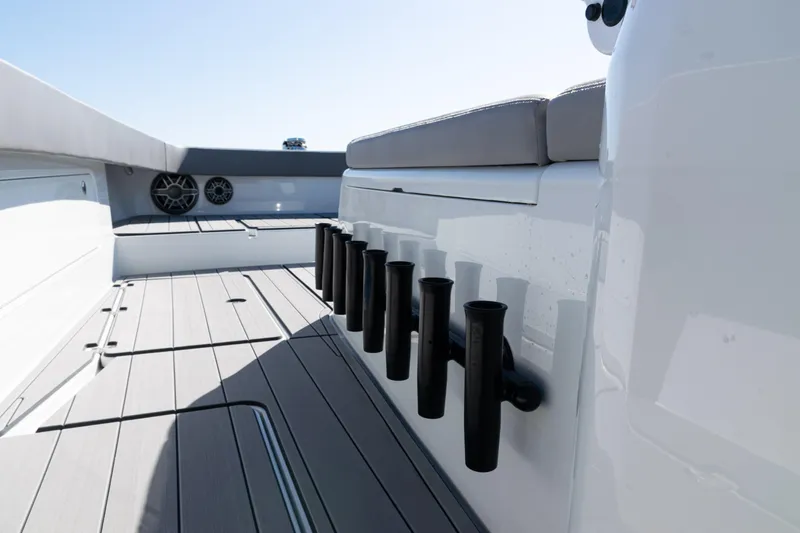  Yacht Photos Pics 2024 Freeman 47 boat interior with rod holders and sleek deck design.