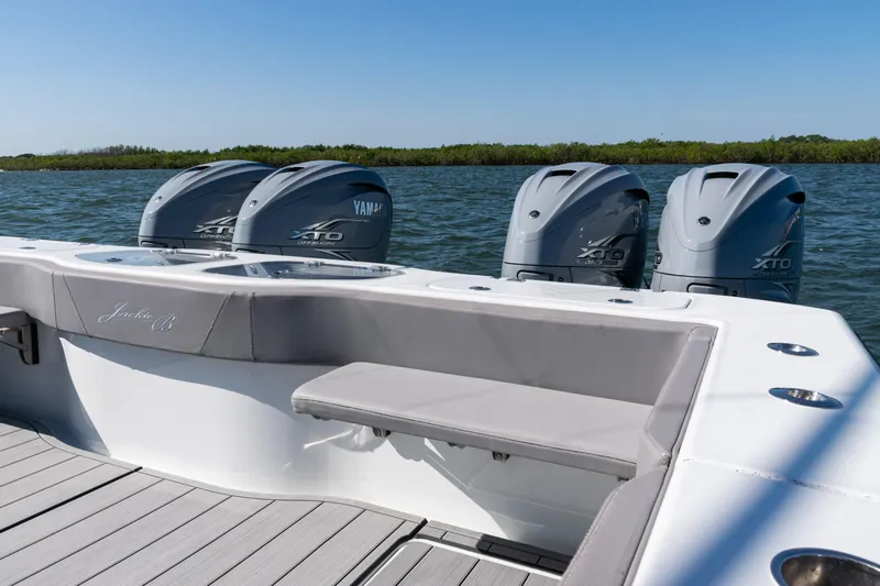  Yacht Photos Pics 2024 Freeman 47 boat with Yamaha XTO engines on a calm water backdrop.