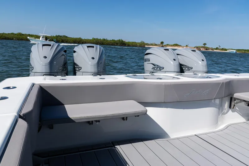  Yacht Photos Pics 2024 Freeman 47 boat with Yamaha XTO engines on a calm water backdrop.