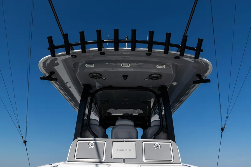  Yacht Photos Pics 2024 Freeman 47 boat with sleek design and advanced features against clear blue sky.