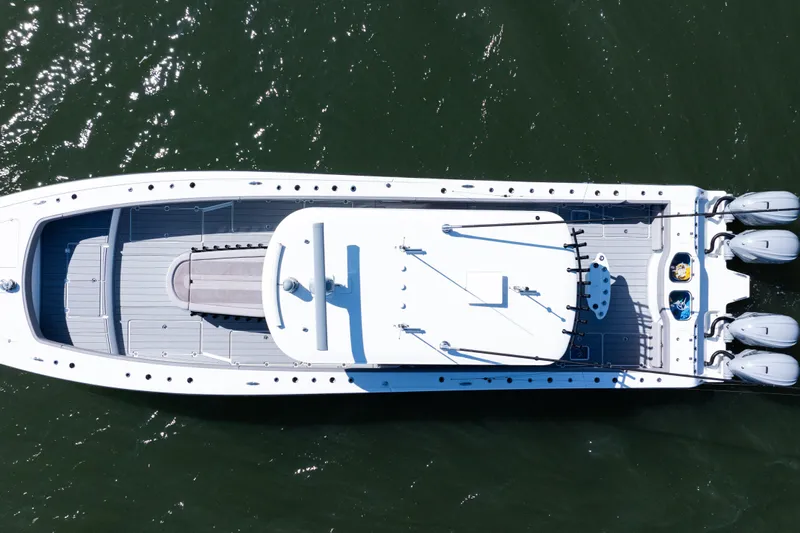  Yacht Photos Pics Aerial view of 2024 Freeman 47 boat with four engines on water.