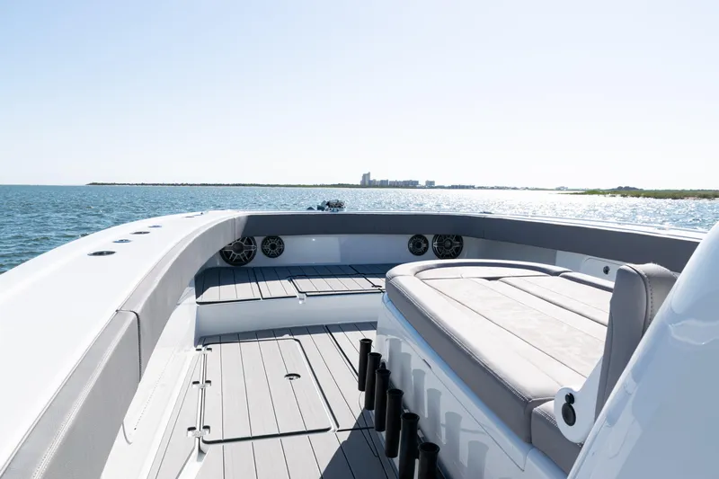  Yacht Photos Pics 2024 Freeman 47 boat interior with sleek seating, ocean view, and modern design.