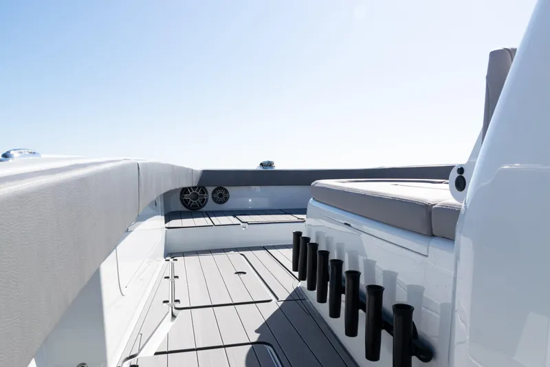  Yacht Photos Pics 2024 Freeman 47 boat interior with seating and rod holders, showcasing modern design.