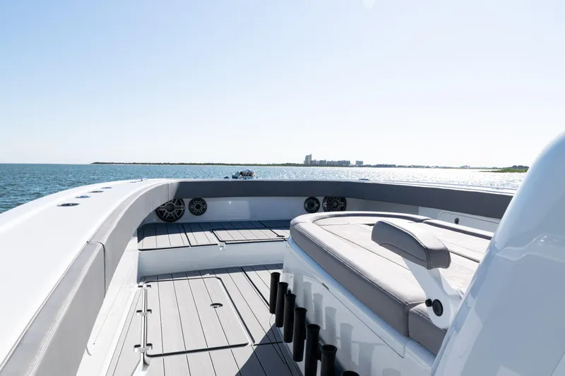  Yacht Photos Pics 2024 Freeman 47 boat interior with seating, ocean view, and clear sky.