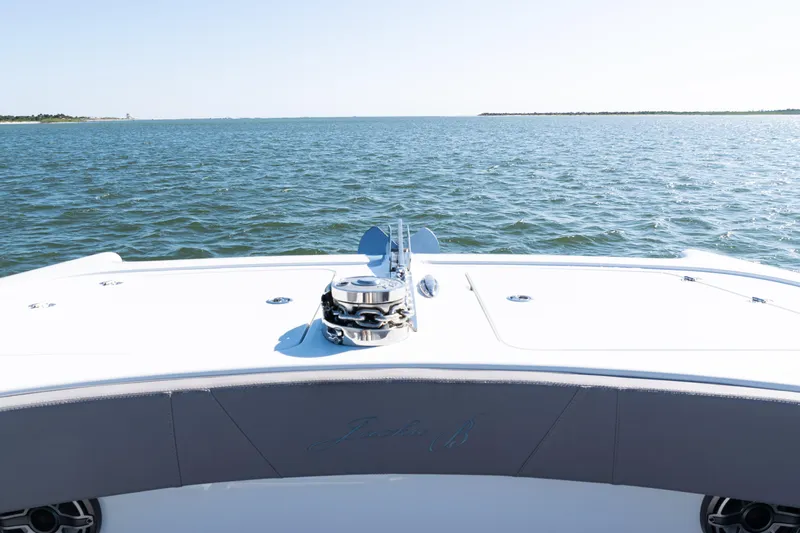  Yacht Photos Pics 2024 Freeman 47 boat on open water, showcasing sleek deck design and ocean view.