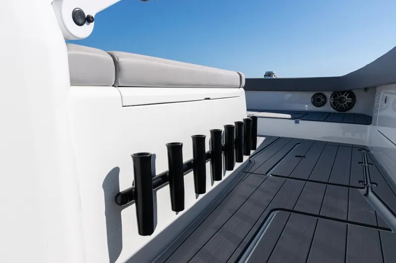  Yacht Photos Pics 2024 Freeman 47 boat interior with rod holders and cushioned seating.