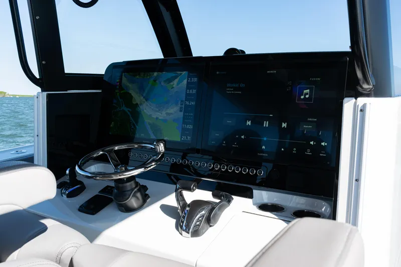  Yacht Photos Pics 2024 Freeman 47 boat dashboard with navigation and audio controls on display.