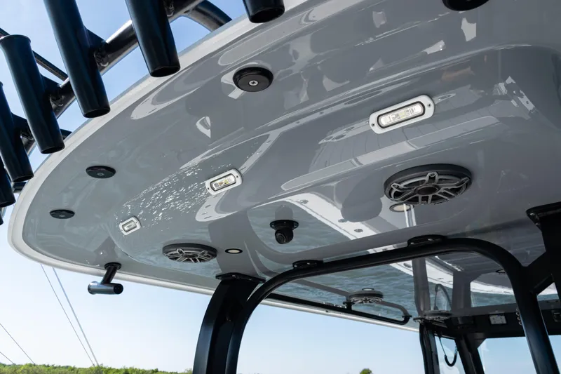  Yacht Photos Pics 2024 Freeman 47 boat roof with speakers and lights, featuring sleek design and modern fixtures.