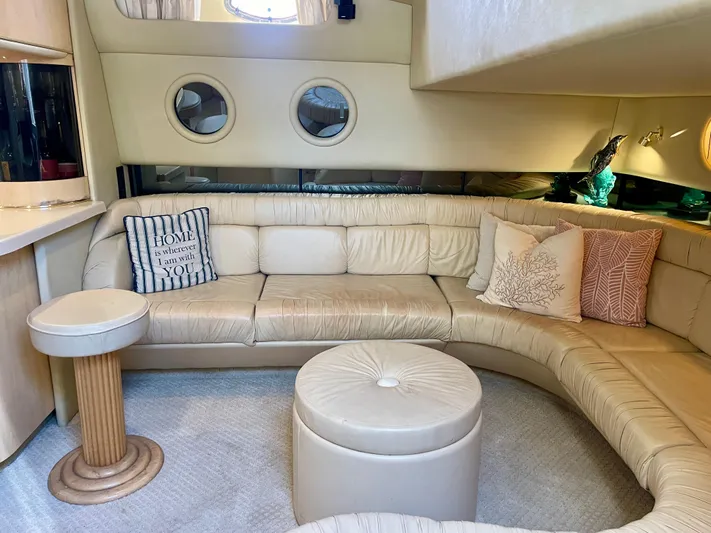 No Doubts IV Yacht Photos Pics Luxurious interior of 1999 Sea Ray 500 Sundancer yacht with plush seating and elegant decor.
