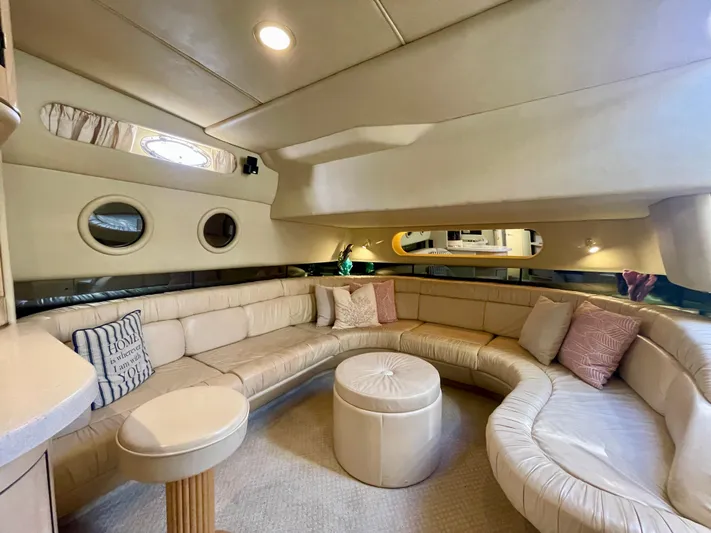 No Doubts IV Yacht Photos Pics Luxurious interior of 1999 Sea Ray 500 Sundancer yacht with plush seating and elegant decor.