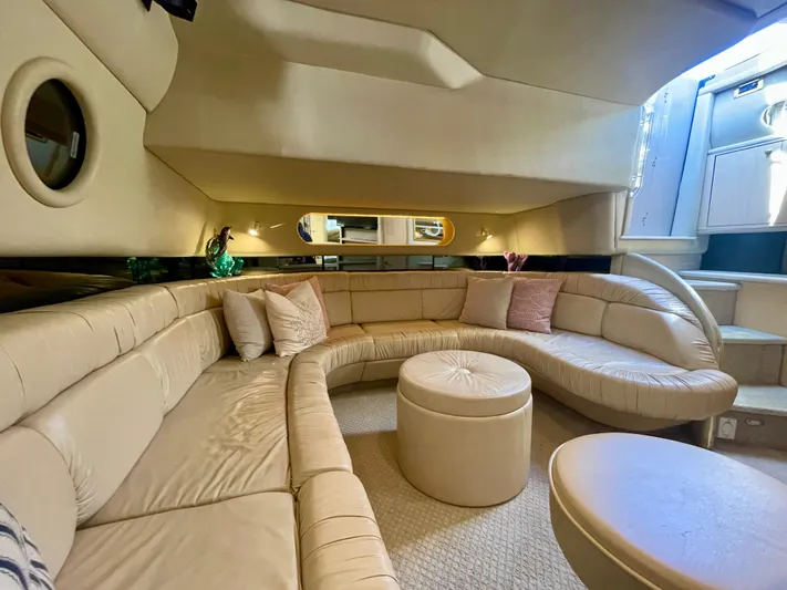No Doubts IV Yacht Photos Pics Luxurious interior of a 1999 Sea Ray 500 Sundancer yacht with plush seating.