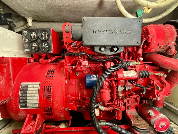 No Doubts IV Yacht Photos Pics Engine compartment of a 1999 Sea Ray 500 Sundancer with Westerbeke generator.