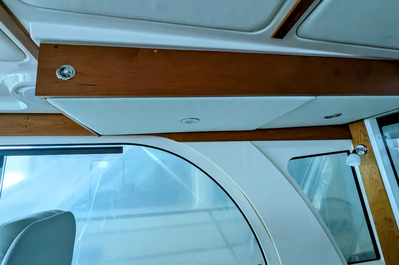  Yacht Photos Pics Interior view of 2024 Back Cove 39O yacht, featuring wood accents and modern design elements.