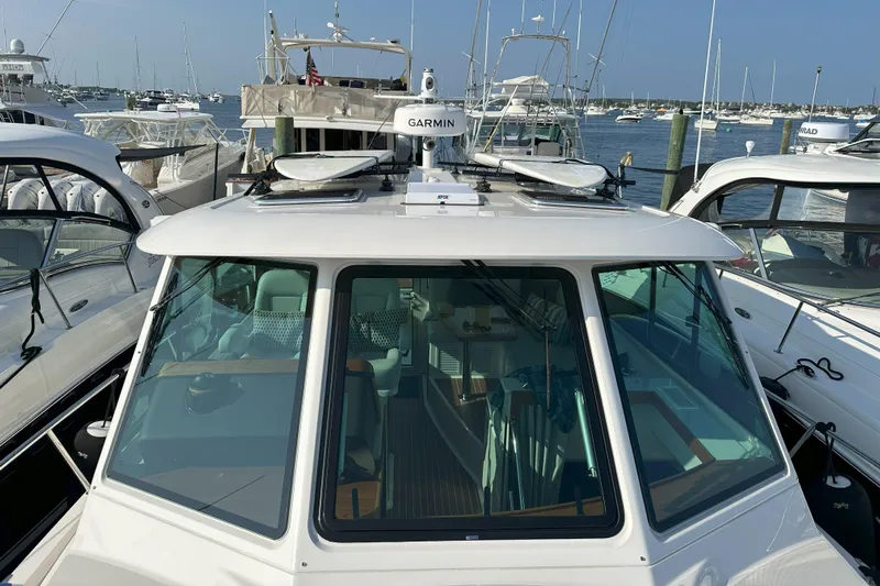  Yacht Photos Pics 2024 Back Cove 39O boat docked, featuring Garmin equipment and sleek design.