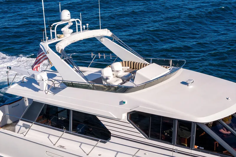 Esperanca Yacht Photos Pics 1998 West Bay 58 Sonship Pilothouse MY cruising on open water.