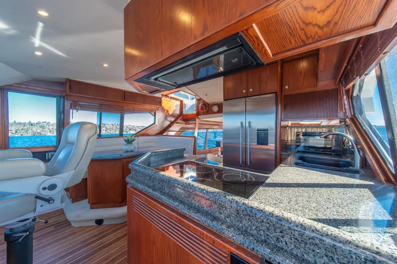 Esperanca Yacht Photos Pics Luxurious 1998 West Bay 58 Sonship Pilothouse MY interior with modern kitchen and scenic views.