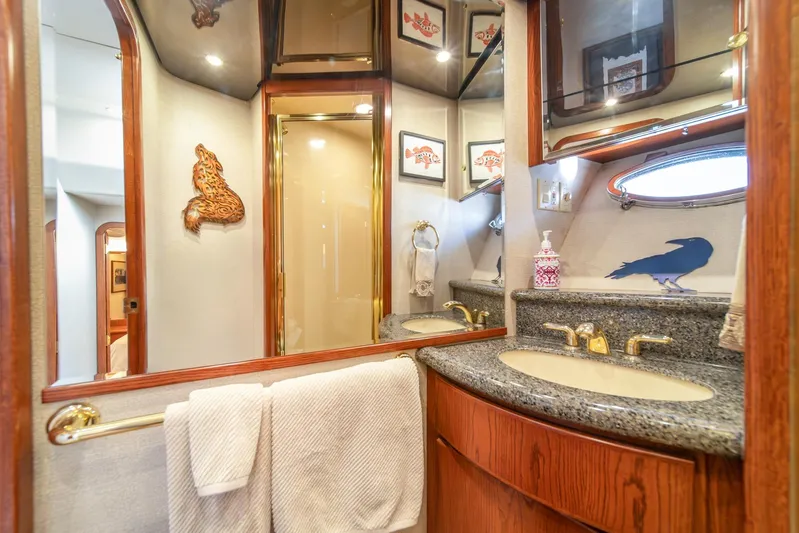 Esperanca Yacht Photos Pics Luxurious bathroom in 1998 West Bay 58 Sonship Pilothouse MY yacht with elegant fixtures.