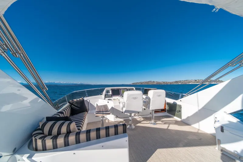 Esperanca Yacht Photos Pics Luxurious 1998 West Bay 58 Sonship Pilothouse MY yacht with elegant seating and ocean view.