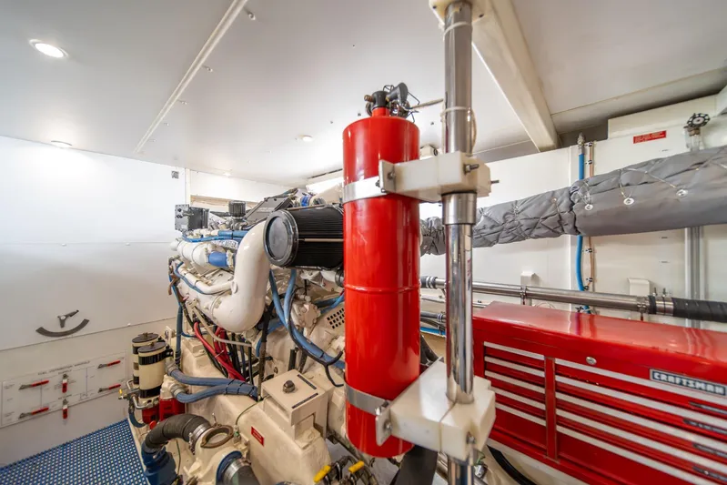 Esperanca Yacht Photos Pics Engine room of 1998 West Bay 58 Sonship Pilothouse MY with visible machinery and tools.