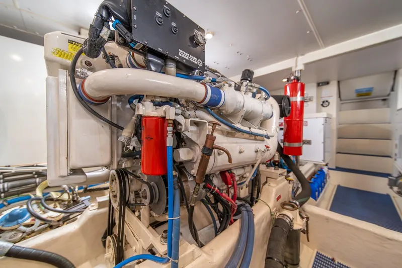 Esperanca Yacht Photos Pics Engine room of 1998 West Bay 58 Sonship Pilothouse MY yacht, showcasing machinery and equipment.