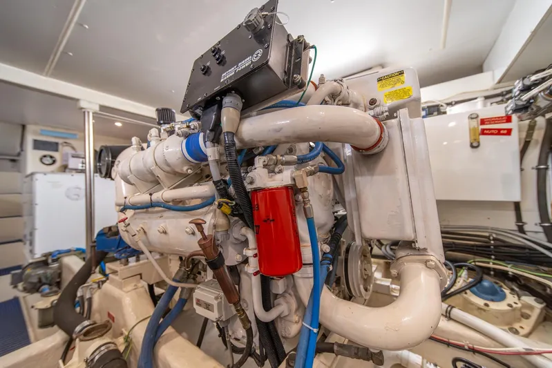 Esperanca Yacht Photos Pics Engine room of 1998 West Bay 58 Sonship Pilothouse MY, showcasing complex machinery and components.