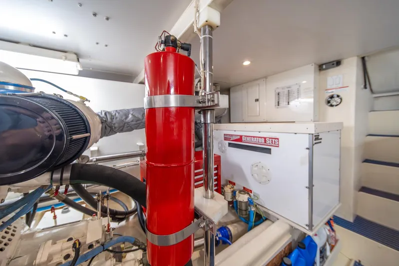 Esperanca Yacht Photos Pics Engine room of 1998 West Bay 58 Sonship Pilothouse MY with generator and equipment.