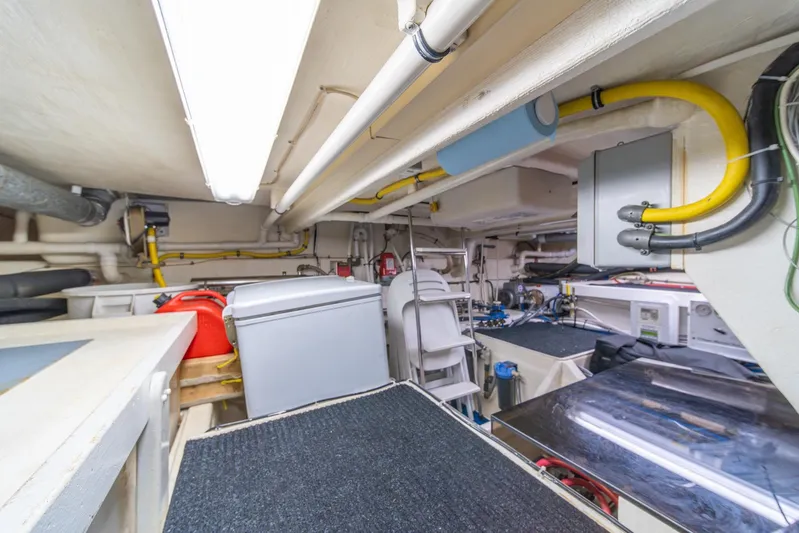 Esperanca Yacht Photos Pics Engine room of 1998 West Bay 58 Sonship Pilothouse MY with equipment and wiring.