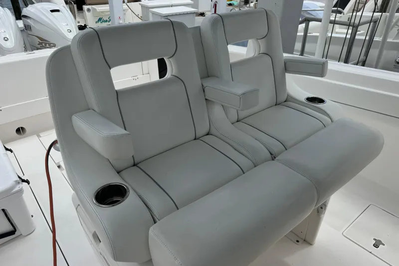  Yacht Photos Pics 2019 Intrepid 345 Nomad FE boat seating with cup holders and armrests.